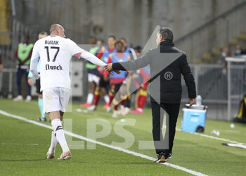 2021-05-07 - Burak Yilmaz of Lille, coach of Lille OSC Christophe Galtier during the French championship Ligue 1 football match between RC Lens and Lille OSC (LOSC) on May 7, 2021 at Stade Bollaert-Delelis in Lens, France - Photo Jean Catuffe / DPPI - RC LENS VS LOSC - FRENCH LIGUE 1 - SOCCER