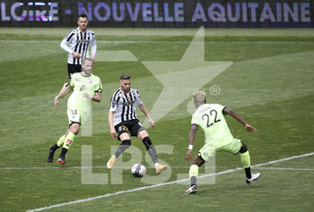 2021-05-09 - Farid El Melali of Angers, Jordan Marie of Dijon (left) during the French championship Ligue 1 football match between Angers SCO and Dijon FCO (DFCO) on May 9, 2021 at Stade Raymond Kopa in Angers, France - Photo Jean Catuffe / DPPI - ANGERS SCO VS DIJON FCO (DFCO) - FRENCH LIGUE 1 - SOCCER