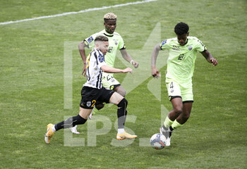 2021-05-09 - Farid El Melali of Angers, Didier Ndong of Dijon, Jonathan Panzo of Dijon during the French championship Ligue 1 football match between Angers SCO and Dijon FCO (DFCO) on May 9, 2021 at Stade Raymond Kopa in Angers, France - Photo Jean Catuffe / DPPI - ANGERS SCO VS DIJON FCO (DFCO) - FRENCH LIGUE 1 - SOCCER