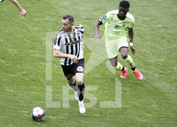2021-05-09 - Mathias Pereira Lage of Angers, Junior Dina Ebimbe of Dijon during the French championship Ligue 1 football match between Angers SCO and Dijon FCO (DFCO) on May 9, 2021 at Stade Raymond Kopa in Angers, France - Photo Jean Catuffe / DPPI - ANGERS SCO VS DIJON FCO (DFCO) - FRENCH LIGUE 1 - SOCCER