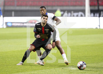 2021-05-09 - Martin Terrier of Stade Rennais, Presnel Kimpembe of PSG during the French championship Ligue 1 football match between Stade Rennais and Paris Saint-Germain on May 9, 2021 at Roazhon Park in Rennes, France - Photo Jean Catuffe / DPPI - STADE RENNAIS VS PARIS SAINT-GERMAIN (PSG) - FRENCH LIGUE 1 - SOCCER