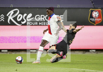 2021-05-09 - Moise Kean of PSG, Nayef Aguerd of Rennes during the French championship Ligue 1 football match between Stade Rennais and Paris Saint-Germain on May 9, 2021 at Roazhon Park in Rennes, France - Photo Jean Catuffe / DPPI - STADE RENNAIS VS PARIS SAINT-GERMAIN (PSG) - FRENCH LIGUE 1 - SOCCER