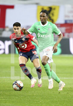 2021-05-16 - Yvan Neyou of Saint-Etienne, Luiz Araujo of Lille (left) during the French championship Ligue 1 football match between Lille OSC (LOSC) and AS Saint-Etienne (ASSE) on May 16, 2021 at Stade Pierre Mauroy in Villeneuve-d'Ascq near Lille, France - Photo Jean Catuffe / DPPI - LILLE OSC (LOSC) VS AS SAINT-ETIENNE (ASSE) - FRENCH LIGUE 1 - SOCCER