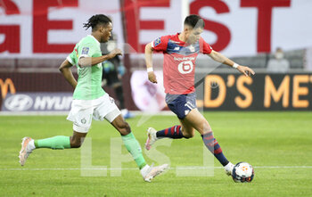 2021-05-16 - Luiz Araujo of Lille, Yvan Neyou of Saint-Etienne (left) during the French championship Ligue 1 football match between Lille OSC (LOSC) and AS Saint-Etienne (ASSE) on May 16, 2021 at Stade Pierre Mauroy in Villeneuve-d'Ascq near Lille, France - Photo Jean Catuffe / DPPI - LILLE OSC (LOSC) VS AS SAINT-ETIENNE (ASSE) - FRENCH LIGUE 1 - SOCCER