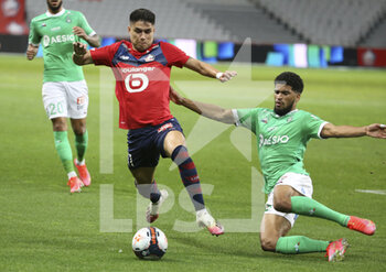 2021-05-16 - Luiz Araujo of Lille, Mahdi Camara of Saint-Etienne during the French championship Ligue 1 football match between Lille OSC (LOSC) and AS Saint-Etienne (ASSE) on May 16, 2021 at Stade Pierre Mauroy in Villeneuve-d'Ascq near Lille, France - Photo Jean Catuffe / DPPI - LILLE OSC (LOSC) VS AS SAINT-ETIENNE (ASSE) - FRENCH LIGUE 1 - SOCCER