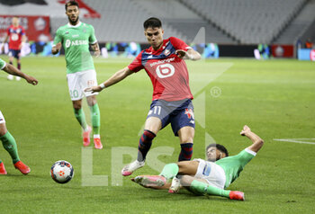 2021-05-16 - Luiz Araujo of Lille, Mahdi Camara of Saint-Etienne during the French championship Ligue 1 football match between Lille OSC (LOSC) and AS Saint-Etienne (ASSE) on May 16, 2021 at Stade Pierre Mauroy in Villeneuve-d'Ascq near Lille, France - Photo Jean Catuffe / DPPI - LILLE OSC (LOSC) VS AS SAINT-ETIENNE (ASSE) - FRENCH LIGUE 1 - SOCCER