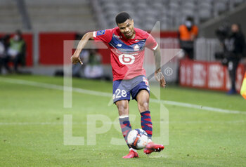 2021-05-16 - Reinildo Mandava of Lille during the French championship Ligue 1 football match between Lille OSC (LOSC) and AS Saint-Etienne (ASSE) on May 16, 2021 at Stade Pierre Mauroy in Villeneuve-d'Ascq near Lille, France - Photo Jean Catuffe / DPPI - LILLE OSC (LOSC) VS AS SAINT-ETIENNE (ASSE) - FRENCH LIGUE 1 - SOCCER