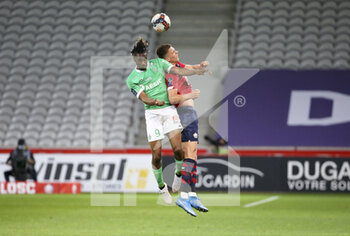 2021-05-16 - Charles Abi of Saint-Etienne, Sven Botman of Lille during the French championship Ligue 1 football match between Lille OSC (LOSC) and AS Saint-Etienne (ASSE) on May 16, 2021 at Stade Pierre Mauroy in Villeneuve-d'Ascq near Lille, France - Photo Jean Catuffe / DPPI - LILLE OSC (LOSC) VS AS SAINT-ETIENNE (ASSE) - FRENCH LIGUE 1 - SOCCER