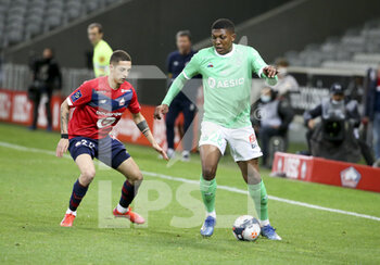 2021-05-16 - Zaydou Youssouf of Saint-Etienne, Domagoj Bradaric of Lille (left) during the French championship Ligue 1 football match between Lille OSC (LOSC) and AS Saint-Etienne (ASSE) on May 16, 2021 at Stade Pierre Mauroy in Villeneuve-d'Ascq near Lille, France - Photo Jean Catuffe / DPPI - LILLE OSC (LOSC) VS AS SAINT-ETIENNE (ASSE) - FRENCH LIGUE 1 - SOCCER