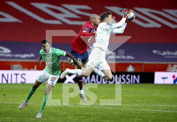 2021-05-16 - From right goalkeeper of Saint-Etienne Etienne Green, Burak Yilmaz of Lille, Timothee Kolodziejczak of Saint-Etienne during the French championship Ligue 1 football match between Lille OSC (LOSC) and AS Saint-Etienne (ASSE) on May 16, 2021 at Stade Pierre Mauroy in Villeneuve-d'Ascq near Lille, France - Photo Jean Catuffe / DPPI - LILLE OSC (LOSC) VS AS SAINT-ETIENNE (ASSE) - FRENCH LIGUE 1 - SOCCER