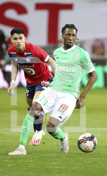 2021-05-16 - Yvan Neyou of Saint-Etienne, Luiz Araujo of Lille (left) during the French championship Ligue 1 football match between Lille OSC (LOSC) and AS Saint-Etienne (ASSE) on May 16, 2021 at Stade Pierre Mauroy in Villeneuve-d'Ascq near Lille, France - Photo Jean Catuffe / DPPI - LOSC LILLE VS AS SAINT-ETIENNE - FRENCH LIGUE 1 - SOCCER