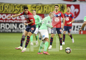 2021-05-16 - Luiz Araujo of Lille, Wahbi Khazri of Saint-Etienne during the French championship Ligue 1 football match between Lille OSC (LOSC) and AS Saint-Etienne (ASSE) on May 16, 2021 at Stade Pierre Mauroy in Villeneuve-d'Ascq near Lille, France - Photo Jean Catuffe / DPPI - LOSC LILLE VS AS SAINT-ETIENNE - FRENCH LIGUE 1 - SOCCER