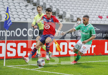 2021-05-16 - Luiz Araujo of LOSC and Miguel Trauco of Saint-Etienne during the French championship Ligue 1 football match between LOSC Lille and AS Saint-Etienne on May 16, 2021 at Pierre Mauroy stadium in Villeneuve-d'Ascq near Lille, France - Photo Loic Baratoux / DPPI - LOSC LILLE VS AS SAINT-ETIENNE - FRENCH LIGUE 1 - SOCCER