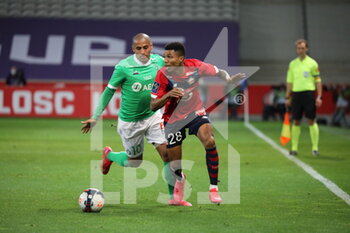 2021-05-16 - Duel REINILDO 28 LOSC and Wahbi KHAZRI 10 ASSE during the French championship Ligue 1 football match between LOSC Lille and AS Saint-Etienne on May 16, 2021 at Pierre Mauroy stadium in Villeneuve-d'Ascq near Lille, France - Photo Laurent Sanson / LS Medianord / DPPI - LOSC LILLE VS AS SAINT-ETIENNE - FRENCH LIGUE 1 - SOCCER