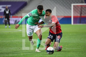 2021-05-16 - Duel MOUEFFEK 34 ASSE and REINILDO 28 LOSC during the French championship Ligue 1 football match between LOSC Lille and AS Saint-Etienne on May 16, 2021 at Pierre Mauroy stadium in Villeneuve-d'Ascq near Lille, France - Photo Laurent Sanson / LS Medianord / DPPI - LOSC LILLE VS AS SAINT-ETIENNE - FRENCH LIGUE 1 - SOCCER