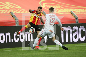 2021-05-23 - Duel CLAUSS 11 Lens and ENRIQUE 12 Monaco during the French championship Ligue 1 football match between RC Lens and AS Monaco on May, 23, 2021 at Bollaert-Delelis stadium in Lens, France - Photo Laurent Sanson / LS Medianord / DPPI - RC LENS VS AS MONACO - FRENCH LIGUE 1 - SOCCER