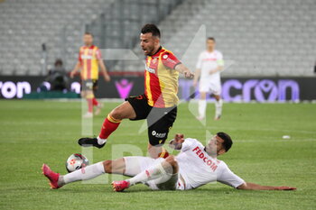 2021-05-23 - Duel MARIPAN 3 Monaco and JEAN 25 Lens during the French championship Ligue 1 football match between RC Lens and AS Monaco on May, 23, 2021 at Bollaert-Delelis stadium in Lens, France - Photo Laurent Sanson / LS Medianord / DPPI - RC LENS VS AS MONACO - FRENCH LIGUE 1 - SOCCER