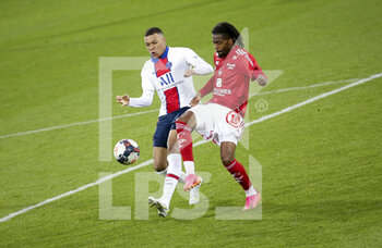 2021-05-23 - Kylian Mbappe of PSG, Jean-Kevin Duverne of Brest during the French championship Ligue 1 football match between Stade Brestois 29 and Paris Saint-Germain (PSG) on May 23, 2021 at Stade Francis Le Ble in Brest, France - Photo Jean Catuffe / DPPI - STADE BRESTOIS 29 VS PARIS SAINT-GERMAIN (PSG) - FRENCH LIGUE 1 - SOCCER