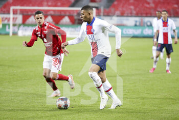 2021-05-23 - Kylian Mbappe of PSG, Romain Faivre of Brest (left) during the French championship Ligue 1 football match between Stade Brestois 29 and Paris Saint-Germain (PSG) on May 23, 2021 at Stade Francis Le Ble in Brest, France - Photo Jean Catuffe / DPPI - STADE BRESTOIS 29 VS PARIS SAINT-GERMAIN (PSG) - FRENCH LIGUE 1 - SOCCER