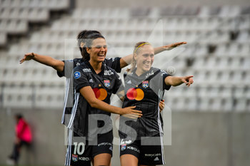 2020-09-11 - Dzsenifer Marozsan of Olympique Lyonnais and Janice Cayman of Olympique Lyonnais celebrate the goal during the Women's French championship D1 Arkema football match between Stade de Reims and Olympique Lyonnais on September 11, 2020 at Auguste Delaune stadium in Reims, France - Photo Antoine Massinon / A2M Sport Consulting / DPPI - STADE DE REIMS VS OLYMPIQUE LYONNAIS - FRENCH WOMEN DIVISION 1 - SOCCER