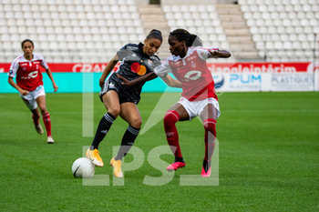 2020-09-11 - Delphine Cascarino of Olympique Lyonnais and Easther Mayi Kith of Stade de Reims in a duel for the ball during the Women's French championship D1 Arkema football match between Stade de Reims and Olympique Lyonnais on September 11, 2020 at Auguste Delaune stadium in Reims, France - Photo Antoine Massinon / A2M Sport Consulting / DPPI - STADE DE REIMS VS OLYMPIQUE LYONNAIS - FRENCH WOMEN DIVISION 1 - SOCCER