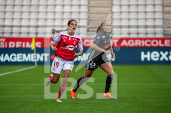 2020-09-11 - Kessya Bussy of Stade de Reims and Janice Cayman of Olympique Lyonnais during the Women's French championship D1 Arkema football match between Stade de Reims and Olympique Lyonnais on September 11, 2020 at Auguste Delaune stadium in Reims, France - Photo Antoine Massinon / A2M Sport Consulting / DPPI - STADE DE REIMS VS OLYMPIQUE LYONNAIS - FRENCH WOMEN DIVISION 1 - SOCCER