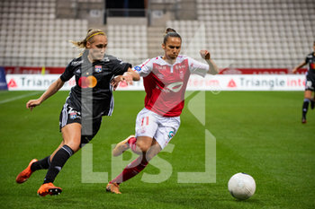 2020-09-11 - Janice Cayman of Olympique Lyonnais and Tanya Romanenko of Stade de Reims fight for the ball during the Women's French championship D1 Arkema football match between Stade de Reims and Olympique Lyonnais on September 11, 2020 at Auguste Delaune stadium in Reims, France - Photo Antoine Massinon / A2M Sport Consulting / DPPI - STADE DE REIMS VS OLYMPIQUE LYONNAIS - FRENCH WOMEN DIVISION 1 - SOCCER