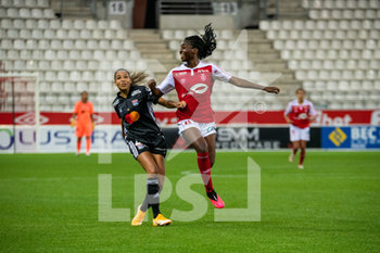 2020-09-11 - Delphine Cascarino of Olympique Lyonnais and Easther Mayi Kith of Stade de Reims during the Women's French championship D1 Arkema football match between Stade de Reims and Olympique Lyonnais on September 11, 2020 at Auguste Delaune stadium in Reims, France - Photo Antoine Massinon / A2M Sport Consulting / DPPI - STADE DE REIMS VS OLYMPIQUE LYONNAIS - FRENCH WOMEN DIVISION 1 - SOCCER