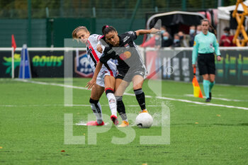 2020-10-02 - Dominika Grabowska of FC Fleury and Sakina Karchaoui of Olympique Lyonnais fight for the ball during the Women's French championship D1 Arkema football match between Fleury 91 FC and Olympique Lyonnais on October 2, 2020 at Walter Felder stadium in Fleury Merogis, France - Photo Melanie Laurent / A2M Sport Consulting / DPPI - FLEURY 91 FC VS OLYMPIQUE LYONNAIS - FRENCH WOMEN DIVISION 1 - SOCCER
