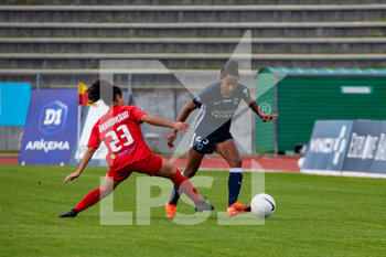2020-10-10 - Sarah Boudaoud of GPSO 92 Issy and Eseosa Aigbogun of Paris FC in a duel for the ball during the Women's French championship D1 Arkema football match between Paris FC and GPSO 92 Issy on October 10, 2020 at Robert Bobin stadium in Bondoufle, France - Photo Melanie Laurent / A2M Sport Consulting / DPPI - PARIS FC VS GPSO 92 ISSY - FRENCH WOMEN DIVISION 1 - SOCCER