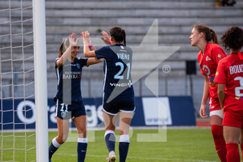2020-10-10 - Clara Mateo of Paris FC and Evelyne Viens of Paris FC celebrate the goal during the Women's French championship D1 Arkema football match between Paris FC and GPSO 92 Issy on October 10, 2020 at Robert Bobin stadium in Bondoufle, France - Photo Melanie Laurent / A2M Sport Consulting / DPPI - PARIS FC VS GPSO 92 ISSY - FRENCH WOMEN DIVISION 1 - SOCCER