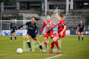 2020-12-12 - Clara Mateo of Paris FC and Lena Goetsch of Dijon FCO fight for the ball during the Women's French championship D1 Arkema football match between Paris FC and Dijon FCO on December 12, 2020 at Robert Bobin stadium in Bondoufle, France - Photo Antoine Massinon / A2M Sport Consulting / DPPI - PARIS FC VS DIJON FCO - FRENCH WOMEN DIVISION 1 - SOCCER