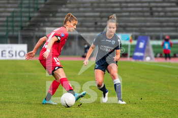 2020-12-12 - Lea Khelifi of Dijon FCO and Thea Greboval of Paris FC fight for the ball during the Women's French championship D1 Arkema football match between Paris FC and Dijon FCO on December 12, 2020 at Robert Bobin stadium in Bondoufle, France - Photo Melanie Laurent / A2M Sport Consulting / DPPI - PARIS FC VS DIJON FCO - FRENCH WOMEN DIVISION 1 - SOCCER