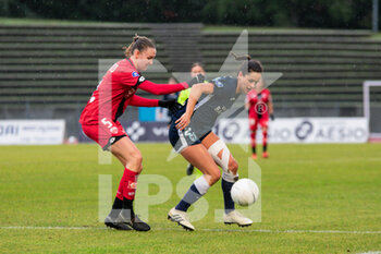 2020-12-12 - Helene Fercocq of Dijon FCO and Evelyne Viens of Paris FC in a duel for the ball during the Women's French championship D1 Arkema football match between Paris FC and Dijon FCO on December 12, 2020 at Robert Bobin stadium in Bondoufle, France - Photo Melanie Laurent / A2M Sport Consulting / DPPI - PARIS FC VS DIJON FCO - FRENCH WOMEN DIVISION 1 - SOCCER