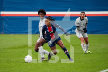 2020-12-13 - Luce Ndolo Ewele of Le Havre AC and Ashley Lawrence of Paris Saint Germain fight for the ball during the Women's French championship D1 Arkema football match between Paris Saint-Germain and Le Havre AC on December 13, 2020 at Georges Lefèvre stadium in Saint-Germain-en-Laye, France - Photo Antoine Massinon / A2M Sport Consulting / DPPI - PARIS SAINT-GERMAIN VS LE HAVRE AC - FRENCH WOMEN DIVISION 1 - SOCCER