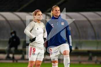 2021-01-22 - Eugenie Le Sommer of Olympique Lyonnais and Amandine Henry of Olympique Lyonnais ahead of the Women's French championship D1 Arkema football match between Paris FC and Olympique Lyonnais on January 22, 2021 at Robert Bobin stadium in Bondoufle, France - Photo Melanie Laurent / A2M Sport Consulting / DPPI - PARIS FC AND OLYMPIQUE LYONNAIS - FRENCH WOMEN DIVISION 1 - SOCCER