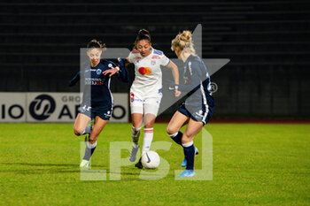 2021-01-22 - Clara Mateo of Paris FC and Selma Bacha of Olympique Lyonnais fight for the ball during the Women's French championship D1 Arkema football match between Paris FC and Olympique Lyonnais on January 22, 2021 at Robert Bobin stadium in Bondoufle, France - Photo Melanie Laurent / A2M Sport Consulting / DPPI - PARIS FC AND OLYMPIQUE LYONNAIS - FRENCH WOMEN DIVISION 1 - SOCCER