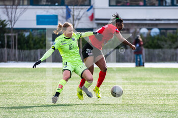 2021-02-13 - Lena Goetsch of Dijon FCO and Roselord Borgella of GPSO 92 Issy fight for the ball during the Women's French championship, D1 Arkema football match between GPSO 92 Issy and Dijon FCO on february 13, 2021 at Le Gallo stadium in Boulogne-Billancourt, France - Photo Antoine Massinon / A2M Sport Consulting / DPPI - GPSO 92 ISSY AND DIJON FCO - FRENCH WOMEN DIVISION 1 - SOCCER