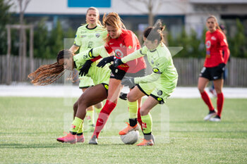 2021-02-13 - Sh Nia Gordon of Dijon FCO, Allison Pantuso of GPSO 92 Issy and Solene Barbance of Dijon FCO fight for the ball during the Women's French championship, D1 Arkema football match between GPSO 92 Issy and Dijon FCO on february 13, 2021 at Le Gallo stadium in Boulogne-Billancourt, France - Photo Melanie Laurent / A2M Sport Consulting / DPPI - GPSO 92 ISSY AND DIJON FCO - FRENCH WOMEN DIVISION 1 - SOCCER