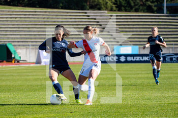 2021-02-27 - Clara Mateo of Paris FC and Louise Fleury of EA Guingamp fight for the ball during the Women's French championship D1 Arkema football match between Paris FC and EA Guingamp on February 27, 2021 at Robert Bobin stadium in Bondoufle, France - Photo Antoine Massinon / A2M Sport Consulting / DPPI - PARIS FC AND EA GUINGAMP - FRENCH WOMEN DIVISION 1 - SOCCER