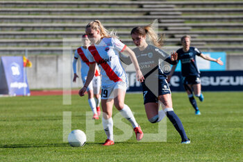 2021-02-27 - Emmy Jezequel of EA Guingamp and Tess Laplacette of Paris FC fight for the ball during the Women's French championship D1 Arkema football match between Paris FC and EA Guingamp on February 27, 2021 at Robert Bobin stadium in Bondoufle, France - Photo Melanie Laurent / A2M Sport Consulting / DPPI - PARIS FC AND EA GUINGAMP - FRENCH WOMEN DIVISION 1 - SOCCER