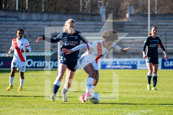 2021-02-27 - Linda Sallstrom of Paris FC and Lea Sotier of EA Guingamp fight for the ball during the Women's French championship D1 Arkema football match between Paris FC and EA Guingamp on February 27, 2021 at Robert Bobin stadium in Bondoufle, France - Photo Melanie Laurent / A2M Sport Consulting / DPPI - PARIS FC AND EA GUINGAMP - FRENCH WOMEN DIVISION 1 - SOCCER