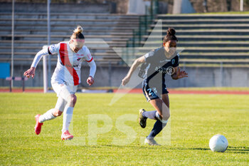 2021-02-27 - Faustine Robert of EA Guingamp and Eseosa Aigbogun of Paris FC fight for the ball during the Women's French championship D1 Arkema football match between Paris FC and EA Guingamp on February 27, 2021 at Robert Bobin stadium in Bondoufle, France - Photo Melanie Laurent / A2M Sport Consulting / DPPI - PARIS FC AND EA GUINGAMP - FRENCH WOMEN DIVISION 1 - SOCCER