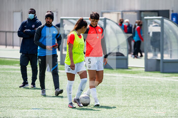 2021-04-17 - Ines Belloumou of Montpellier Herault Sport Club and Elisa De Almeida of Montpellier Herault Sport Club warm up ahead of the Women's French championship D1 Arkema football match between GPSO 92 Issy and Montpellier HSC on April 17, 2021 at Le Gallo stadium in Boulogne-Billancourt, France - Photo Antoine Massinon / A2M Sport Consulting / DPPI - GPSO 92 ISSY VS MONTPELLIER HSC - FRENCH WOMEN DIVISION 1 - SOCCER