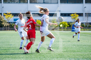 2021-04-17 - Celya Barclais of GPSO 92 Issy and Sarah Puntigam of Montpellier Herault Sport Club fight for the ball during the Women's French championship D1 Arkema football match between GPSO 92 Issy and Montpellier HSC on April 17, 2021 at Le Gallo stadium in Boulogne-Billancourt, France - Photo Melanie Laurent / A2M Sport Consulting / DPPI - GPSO 92 ISSY VS MONTPELLIER HSC - FRENCH WOMEN DIVISION 1 - SOCCER