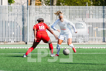 2021-04-17 - Kayla Mills of GPSO 92 Issy fights for the ball during the Women's French championship D1 Arkema football match between GPSO 92 Issy and Montpellier HSC on April 17, 2021 at Le Gallo stadium in Boulogne-Billancourt, France - Photo Melanie Laurent / A2M Sport Consulting / DPPI - GPSO 92 ISSY VS MONTPELLIER HSC - FRENCH WOMEN DIVISION 1 - SOCCER