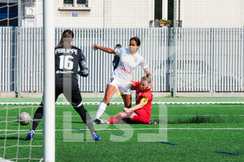 2021-04-17 - Mary Fowler of Montpellier Herault Sport Club and Gwenaelle Butel of GPSO 92 Issy Elisa De Almeida of Montpellier Herault Sport Club celebrates after scoring during the Women's French championship D1 Arkema football match between GPSO 92 Issy and Montpellier HSC on April 17, 2021 at Le Gallo stadium in Boulogne-Billancourt, France - Photo Antoine Massinon / A2M Sport Consulting / DPPI - GPSO 92 ISSY VS MONTPELLIER HSC - FRENCH WOMEN DIVISION 1 - SOCCER