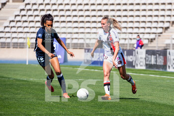 2021-04-24 - Coumba Sow of Paris FC and Maureen Bigot of FC Fleury fight for the ball during the Women's French championship D1 Arkema football match between Paris FC and FC Fleury 91 on April 24, 2021 at Charlety stadium in Paris, France - Photo Melanie Laurent / A2M Sport Consulting / DPPI - PARIS FC VS FC FLEURY 91 - FRENCH WOMEN DIVISION 1 - SOCCER