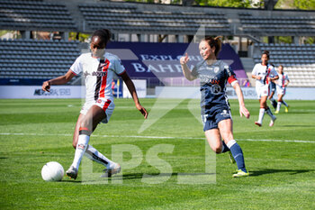 2021-04-24 - Teninsoun Sissoko of FC Fleury and Gaetane Thiney of Paris FC fight for the ball during the Women's French championship D1 Arkema football match between Paris FC and FC Fleury 91 on April 24, 2021 at Charlety stadium in Paris, France - Photo Melanie Laurent / A2M Sport Consulting / DPPI - PARIS FC VS FC FLEURY 91 - FRENCH WOMEN DIVISION 1 - SOCCER