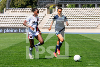 2021-04-24 - Teninsoun Sissoko of FC Fleury and Coumba Sow of Paris FC fight for the ball during the Women's French championship D1 Arkema football match between Paris FC and FC Fleury 91 on April 24, 2021 at Charlety stadium in Paris, France - Photo Melanie Laurent / A2M Sport Consulting / DPPI - PARIS FC VS FC FLEURY 91 - FRENCH WOMEN DIVISION 1 - SOCCER